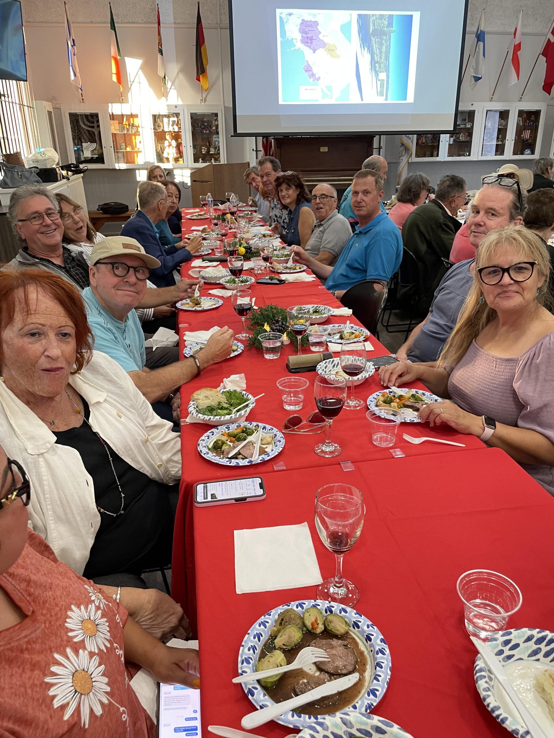 Long table with HOI members having dinner